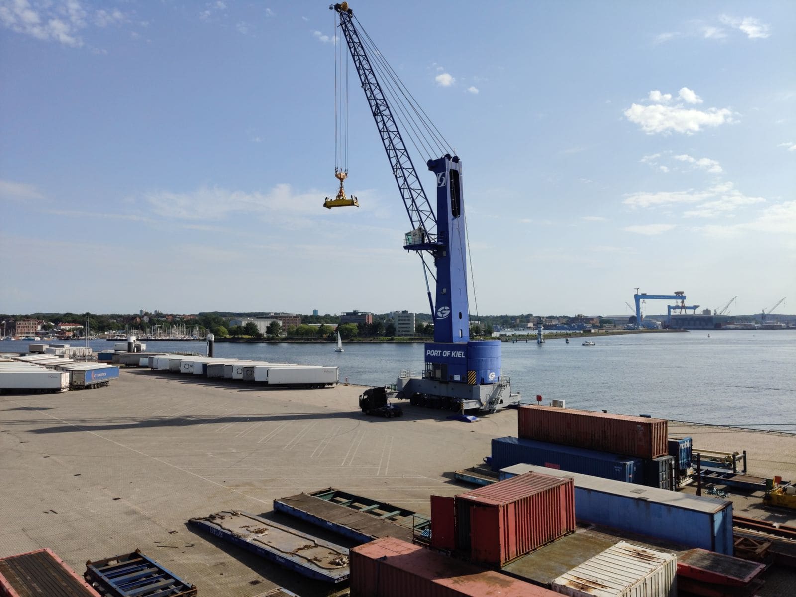 Cranes loading containers at a cargo terminal