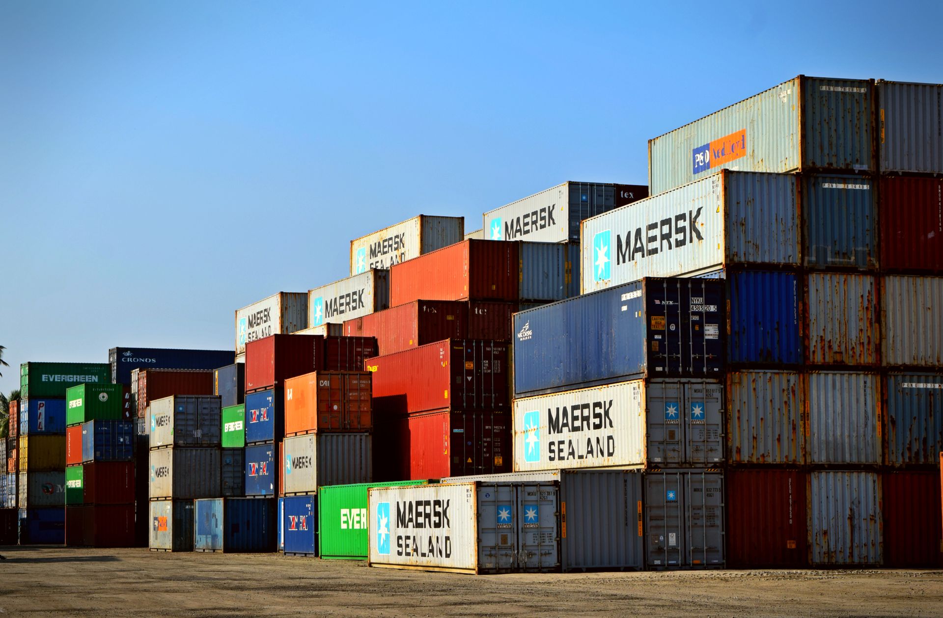 Container ship and port cranes at a cargo terminal