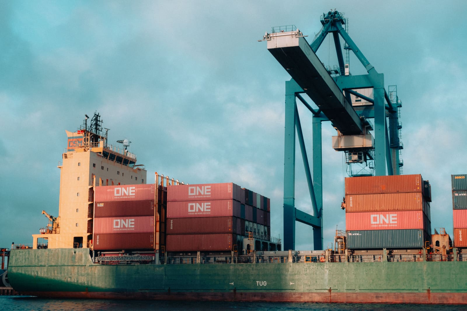 Container vessel departing a deep-water port